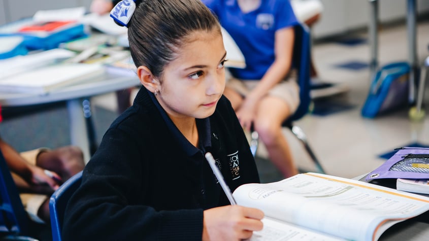 girl doing schoolwork